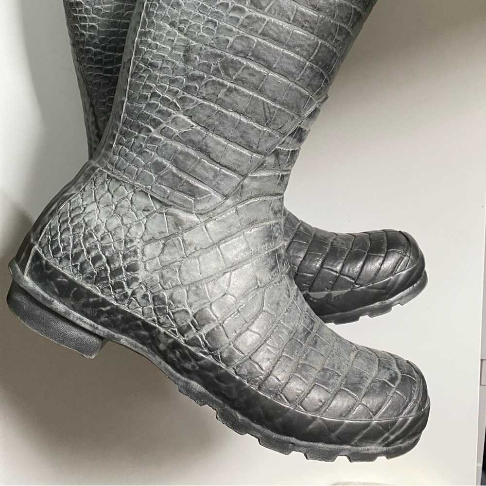 Jimmy Choo’s for Hunter rain boots. Size 7